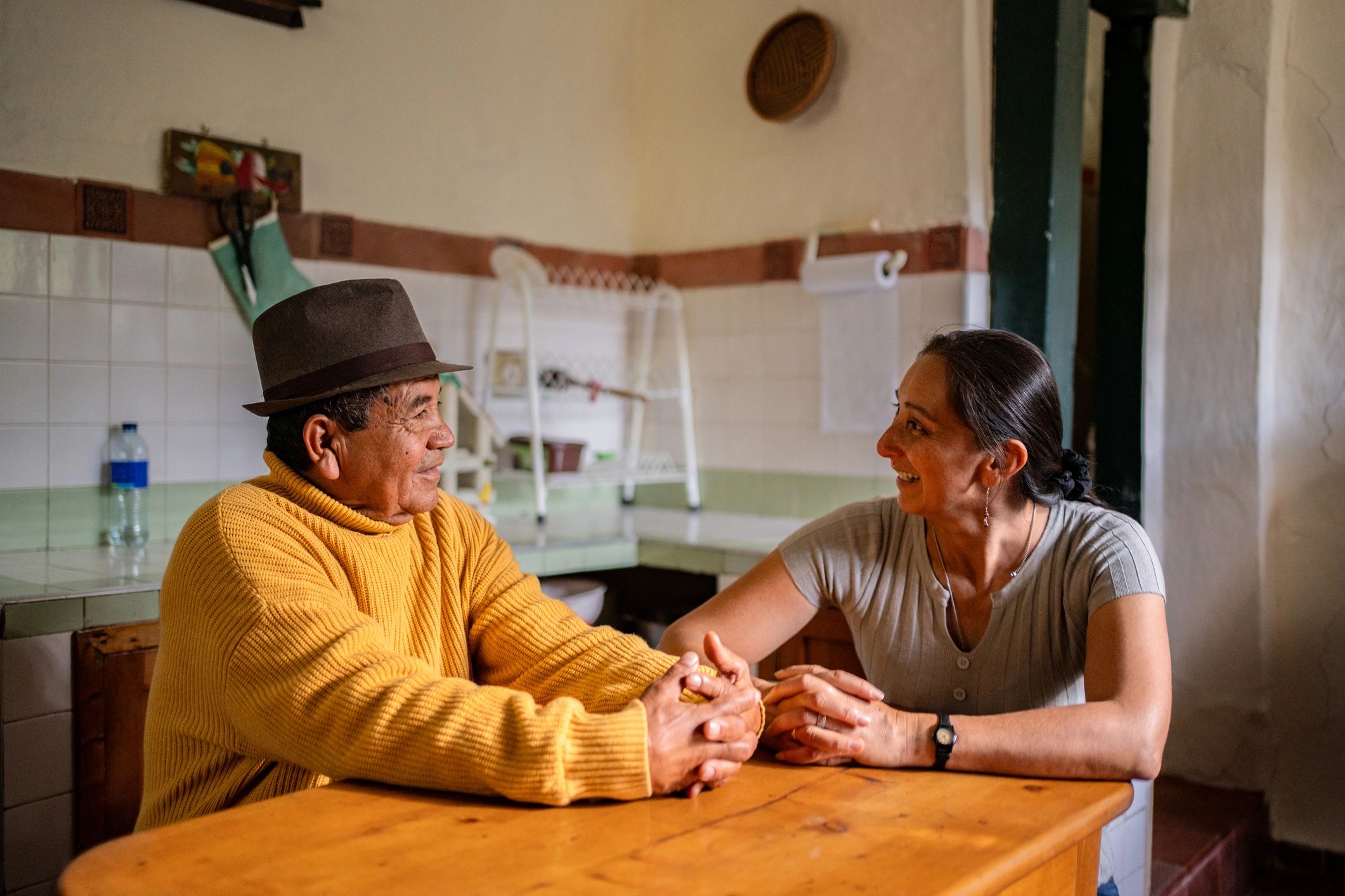 Family members discussing plans together at home